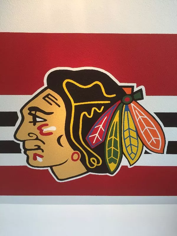 Chicago Blackhawks NHL Logo in Jugendzimmer von Hand auf Wand gemalt